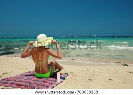 https://thumb1.shutterstock.com/display_pic_with_logo/3597821/708038158/stock-photo-back-view-young-asian-woman-wearing-bikini-and-sunhat-to-take-sunbathing-on-the-beach-708038158.jpg