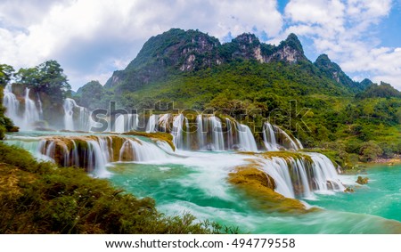Ban Gioc waterfall in Cao Bang, Viet Nam - The waterfalls are located in an area of mature karst formations were the original limestone bedrock layers are being eroded