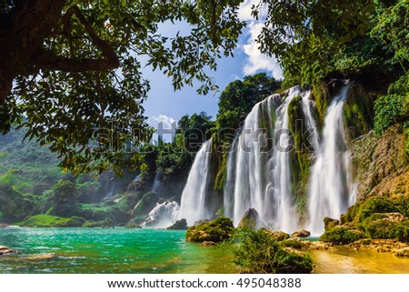 Ban Gioc waterfall in Cao Bang, Viet Nam - The waterfalls are located in an area of mature karst formations were the original limestone bedrock layers are being eroded