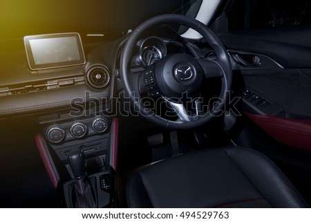 BANGKOK,THAILAND -JULY 10 : Cool and modern interior design of Mazda CX-3 dashboard and driver seat view on July 10,2016 in Bangkok, Thailand.