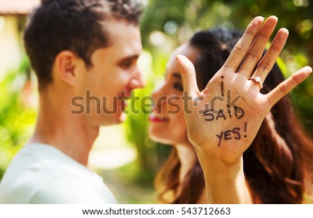 https://thumb1.shutterstock.com/display_pic_with_logo/3625397/543712663/stock-photo-romantic-portrait-of-young-interracial-couple-in-love-hugs-just-got-engaged-shallow-depth-of-543712663.jpg