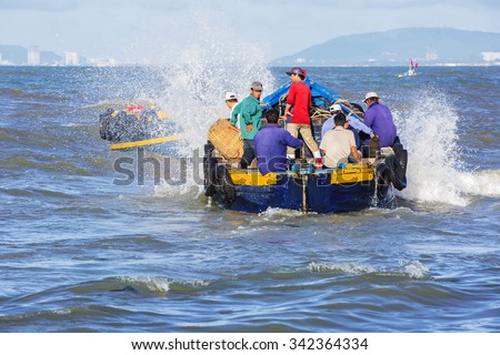 VUNG TAU, VIETNAM - AUG 22,2015: Fishermen on boat at the Fishing Village Long Hai, Vietnam.