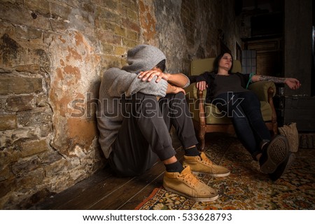 No to drugs concept. Drug addict sleeping after taking drugs. Man and woman with AIDS resting and relaxing. Disease concept.