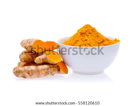 Turmeric roots and turmeric powder in white bowl isolated on white background