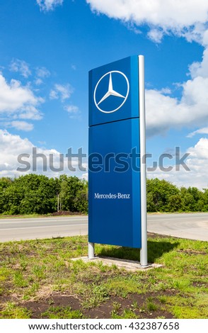SAMARA, RUSSIA - MAY 22, 2016: Official dealership sign of Mercedes-Benz in summer sunny day. Mercedes-Benz is a German automotive manufacturer