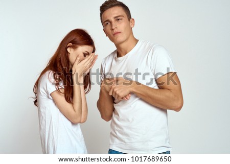 Nude photos of saffron Woman holding a mans face in her hands