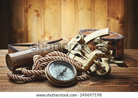 Vintage Still Life With Compasssextant And Spyglass Vintage Still Life With Compasssextant And Spyglass