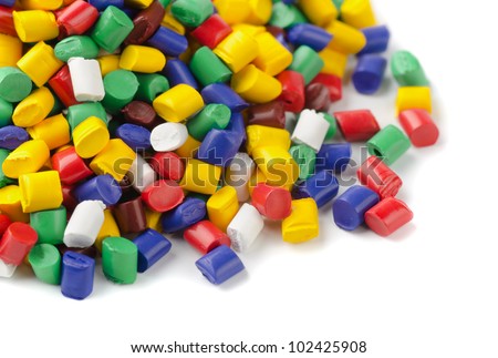 Colorful plastic polymer granules on white
