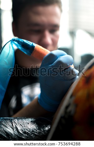 cropped shot tattooist doing tattoo on stock photo 753694288 cropped shot tattooist doing tattoo on stock photo 753694288