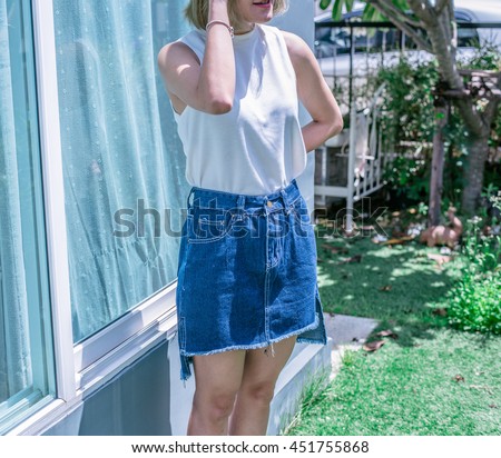 Cute Teenage Girl In Casual Wear And Jean Skirt The Park On Sunny Summer Cute Teenage Girl In Casual Wear And Jean Skirt The Park On Sunny Summer