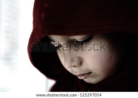 Sad child crying