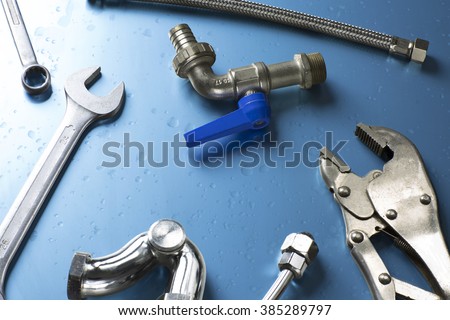 overhead of an essential tool kit for plumber / set of plumber tools