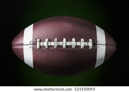 portrait american football ball dark background stock photo royalty