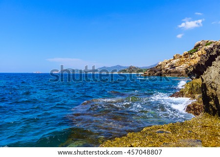 Wonderful seascape at Nui Chua national park, Ninh Thuan, Viet Nam, waves on large rock and make amazing fall in Hang Rai at sunrise, amazing landscape at Vietnam beach, masterpiece place for travel