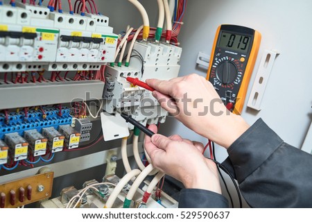 electrician measurements with multimeter tester