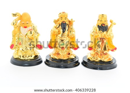 Three statues of Chinese gods of good fortune on a white background