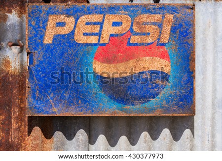 SURATTHANI,THAILAND - JUNE 2 : Old rust condition vintage wall of Pepsi logo. on JUNE 2, 2016 in Suratthani Thailand.