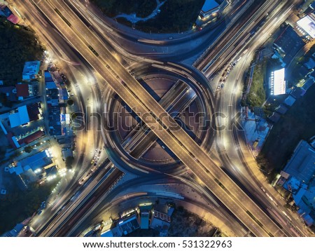 Road roundabout large Aerial The road beautiful at Night , Bird Eye View in bangkok , top view , Bangkok , Thailand .