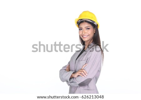 Dark Tan Skin Office Woman in Gray Suit wear Yellow Safety Hard Hat, Studio lighting white background isolated, copy space, safety concept