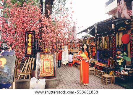 Ho Chi Minh city, 16 Jan 2017 - Dong Khoi ttreet was decorated by various kind of flowers such as peach flower, yellow apricot in Tet holidays, Ho Chi Minh, Vietnam. Vietnam Lunar New Year in spring