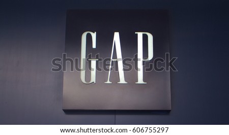 Manila, Philippines - 26 June, 2016: Logo of famous brand "Gap" in Mall of Asia, Manila, Philippines. Casual clothes and denim shop. Mass-market unisex wear. Fashion store entrance. Retail industry