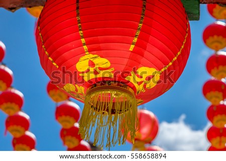 Beautiful red lanterns decorated for Chinese New Year welcoming the year of the rooster