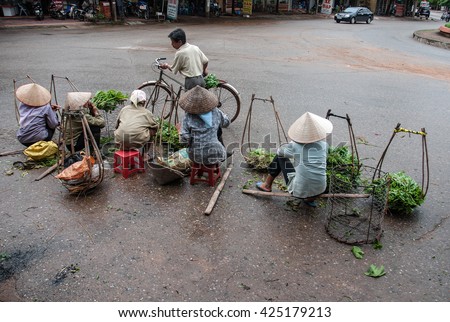 Vinh Phuc, Vietnam, May 23, 2016 farmers groups, rural Vinh Phuc, selling vegetables on the street.