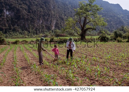 QUANG TRI, VIETNAM, November 18, 2015 Family, Quang tri countryside, Vietnam, gardening