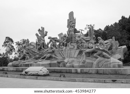 Ha Tinh, Vietnam, July 11, 2016 her monumental 10 youth volunteers. At the ruins of war - Dong Loc T-junction, Ha Tinh, Vietnam
