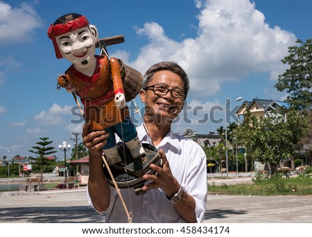 HAI DUONG, Vietnam, July 25, 2016 HAI DUONG, Vietnam, July 25, 2016 man (name unknown) the water puppets, rural Hai Duong, Vietnam