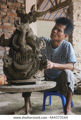 Vinh Phuc, Vietnam, August 6, 2016 traditional pottery village artisans Huong Canh, Vinh Phuc, clay dragon statues, clay materials