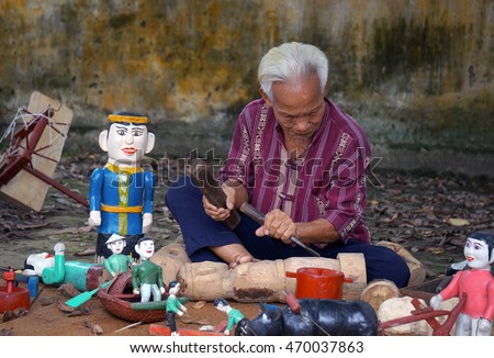 HAI DUONG, Vietnam, August 15, 2016 artisans, producing water puppets, performing arts traditional water puppetry, rural Ninh Giang, Hai Duong Province, Vietnam