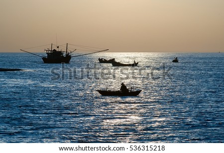 QUANG BINH, Vietnam, July 18, 2016 fishermen fishing in waters Quang Binh, Vietnam, at the dawn
