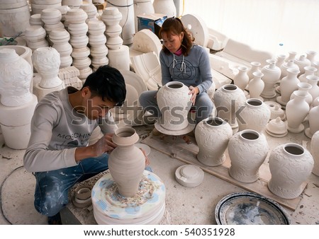 HAI DUONG, VIETNAM, February 14, 2016 the potter (unnamed) is working, traditional ceramic products