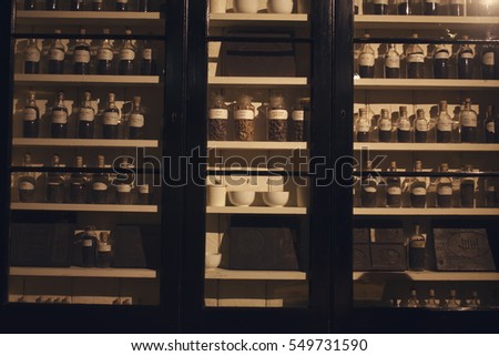 Vintage Spices Bottles on a shelf, colonial era spices