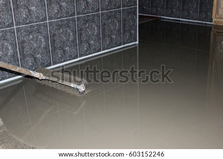 floor leveling filling floor selfleveling compound stock photo floor leveling filling floor selfleveling compound stock photo