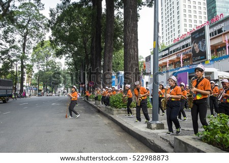 HO CHI MINH CITY, VIET NAM - NOV 26, 2016: A young pupil/student band playing their concert in front of Nha Van Hoa Thanh Nien, Sai Gon, Viet Nam.