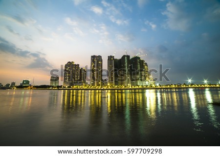 HO CHI MINH, VIET NAM - MAR 11, 2017: Ho Chi Minh city at night, view from a park in district 2, Sai Gon, Viet Nam.