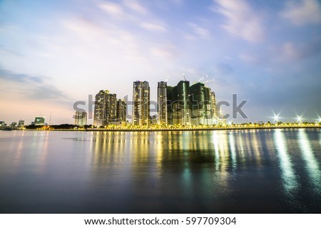 HO CHI MINH, VIET NAM - MAR 11, 2017: Ho Chi Minh city at night, view from a park in district 2, Sai Gon, Viet Nam.