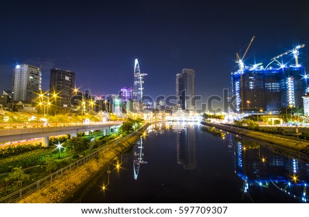 HO CHI MINH, VIET NAM - MAR 11, 2017: Ho Chi Minh city at night, view from Calmet Bridge to Bitexco tower, Sai Gon, Viet Nam.