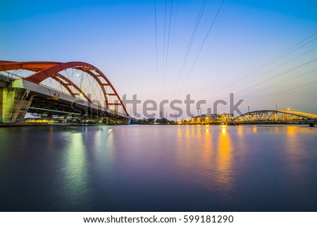 HO CHI MINH CITY, VIET NAM - MAR 13, 2017: Binh Loi bridge 1 and 2 in the same photo, Sai Gon, Viet Nam.