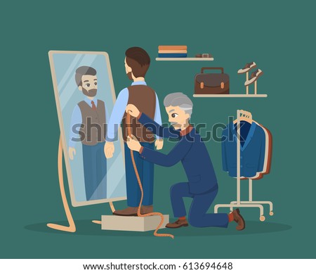 Sewing at atelier. Man making clothes at the tailor.