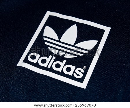ZAGREB , CROATIA - 19 FEBRUARY 2015 - Close up logo of sport brand Adidas printed on textile , product shot