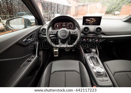 Vinnitsa, Ukraine - May 14, 2017. Audi Q2 concept car.Audi Q2 presentation.Front of the car,front-side, logo Audi,modern car. Presentation Audi Q2.Inside the car,steering wheel,interior of the car