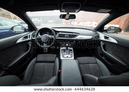 Vinnitsa, Ukraine - May 14, 2017. Audi A6.Front of the car, logo Audi,diesel,TFSI engine, quattro system, sportcar, luxury car, sedan,modern car. Presentation of the new model car- Audi 6