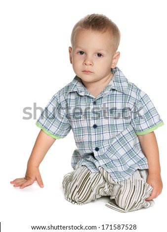 A portrait of a little boy on the white background
