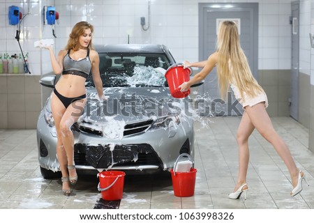 Photo for sexy girls washing car