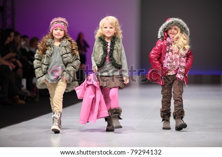 MOSCOW - FEBRUARY 22: Unidentified child models wear fashions by Snowimage and walk the catwalk in Collection Premiere Moscow, an international fashion fair for Eastern Europe, on February 22, 2011 in Moscow, Russia.