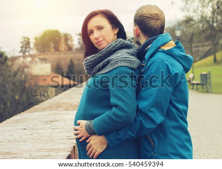 https://thumb1.shutterstock.com/display_pic_with_logo/4313824/540459394/stock-photo-pregnancy-happy-pregnant-couple-walking-in-the-park-at-the-golden-autumn-time-couple-is-having-540459394.jpg