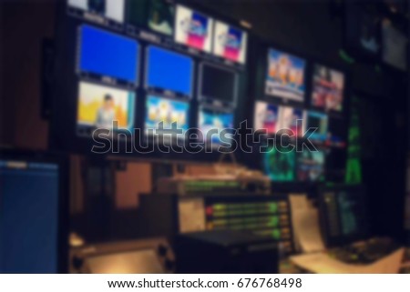 Blurred picture video switch of Television Broadcast, working with video and audio mixer, control broadcasts in recording studio.